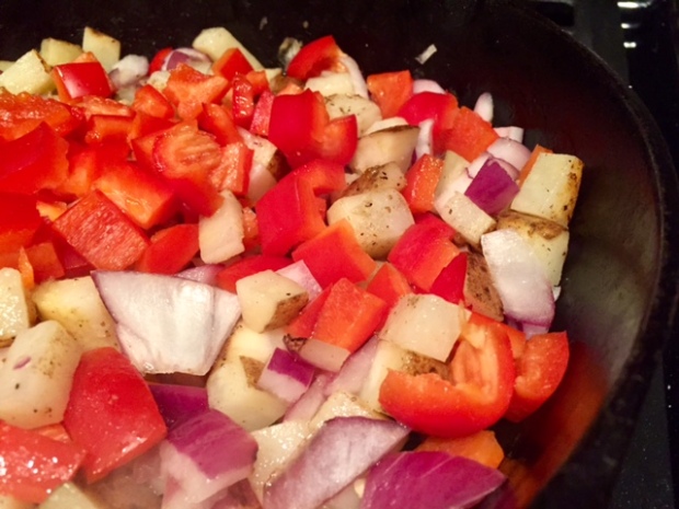 tex-mex-breakfast-casserole-potatoes-onions-peppers-cooking-closeup